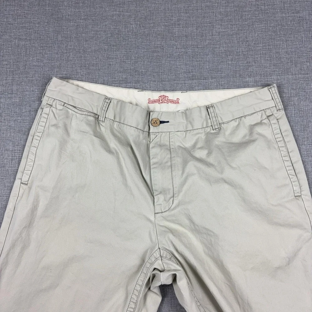 Tommy Bahama Pants Mens 38x30 Beige Chino Relaxed Fit Flat Front Marlin Logo